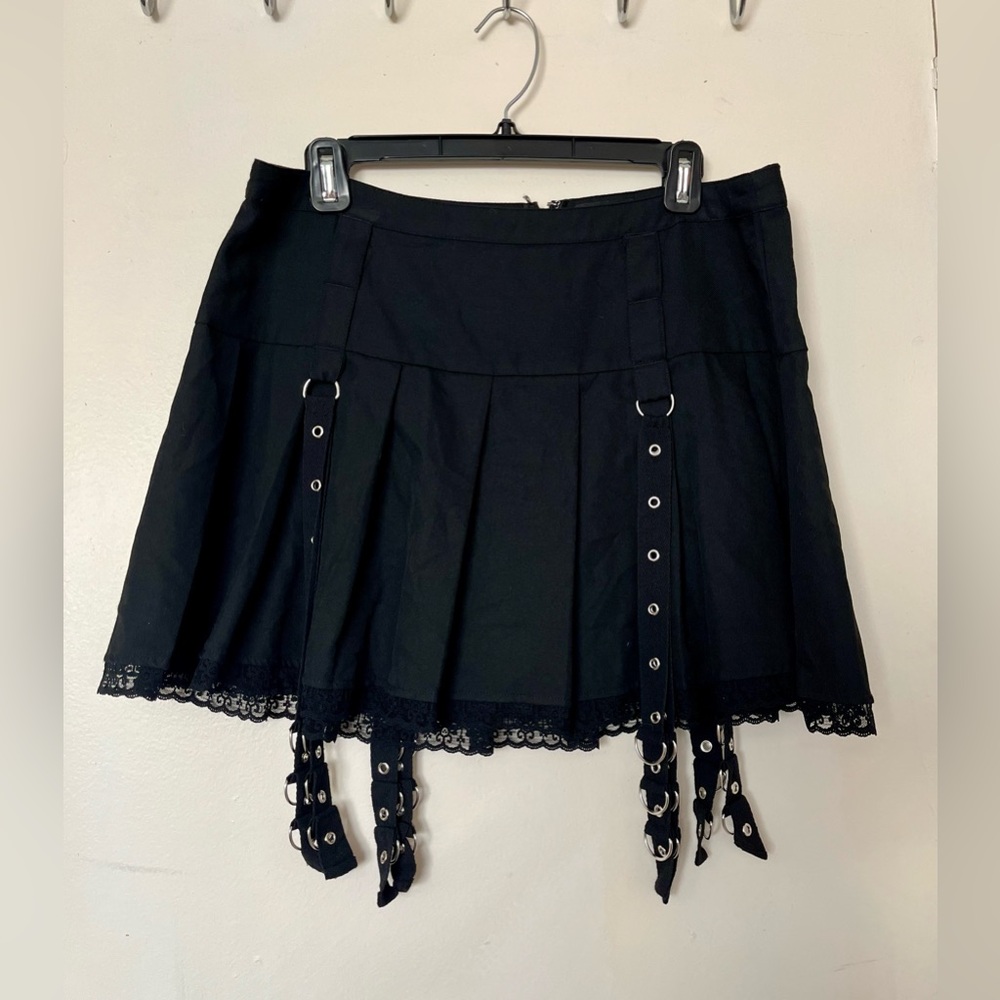 Elegant Black Mini Skirt with Lace and Strap Accents